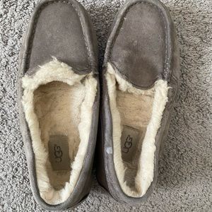 Ugg Slippers size 7. Paint on bottom and a few small specks on surface